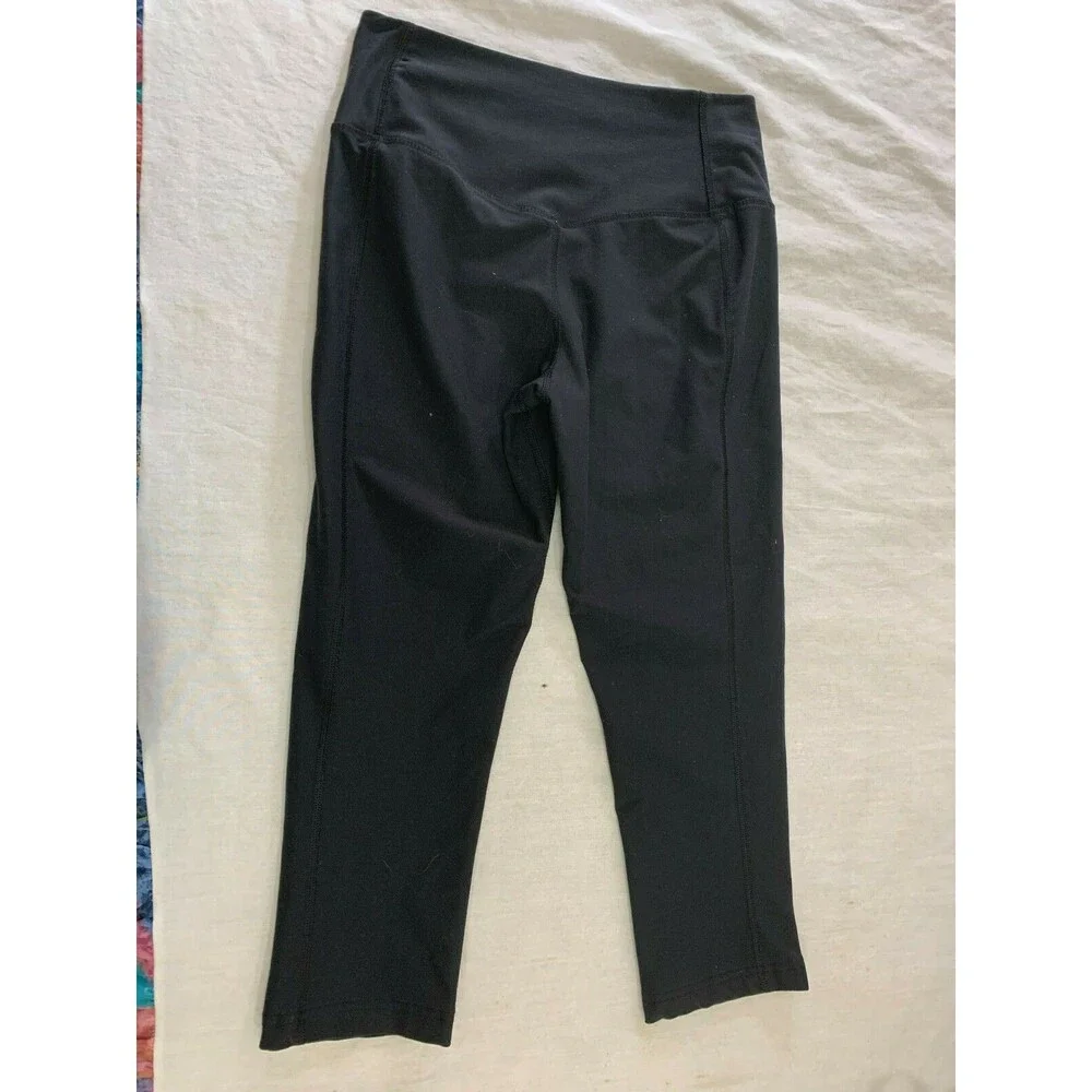 NIKE DRI FIT TEN LESS PLASTIC BOTTLES WOMENS YOGA CAPRIS PANTS SIZE XS